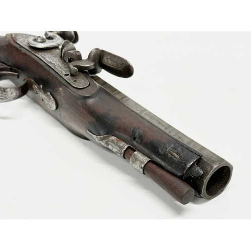 24 - An Early 19th Century Irish flintlock pistol by Thomas Fowler. 27cm