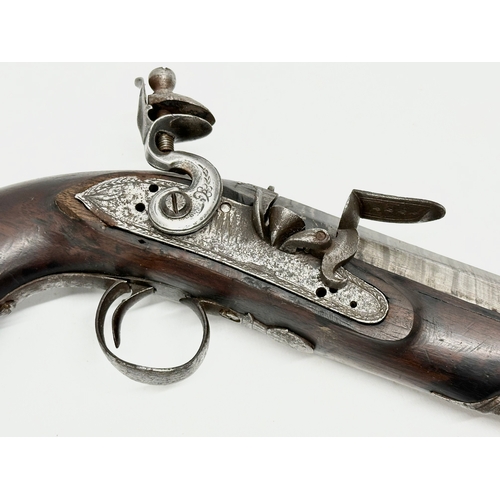 24 - An Early 19th Century Irish flintlock pistol by Thomas Fowler. 27cm