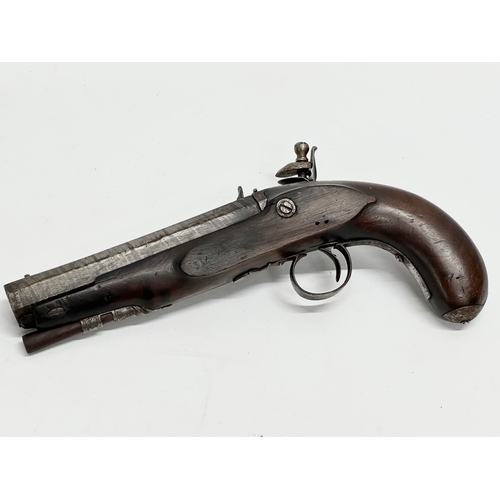 24 - An Early 19th Century Irish flintlock pistol by Thomas Fowler. 27cm