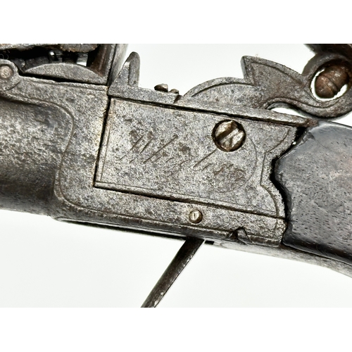 25 - A Late 18th/19th Century boxlock flintlock pistol. 17cm