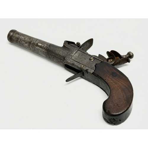 25 - A Late 18th/19th Century boxlock flintlock pistol. 17cm