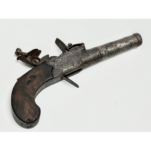 25 - A Late 18th/19th Century boxlock flintlock pistol. 17cm