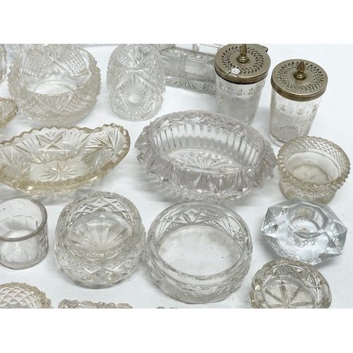 198 - A collection of 19th Century glass salts, match holders etc.