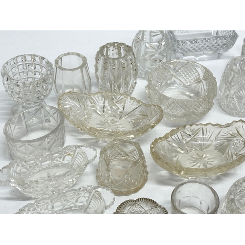 198 - A collection of 19th Century glass salts, match holders etc.