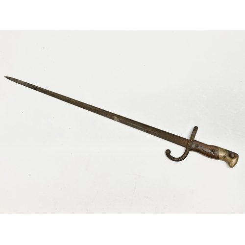 27 - A Late 19th Century French bayonet. 64.5cm