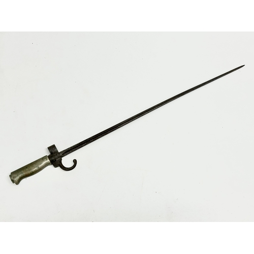 28 - A Late 19th Century French Lebel bayonet. 64cm