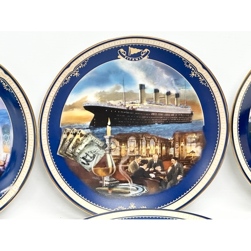 452 - A collection of Limited Edition Titanic plates. An R.M.S Titanic Her Legacy Lives On cake plate by J... 