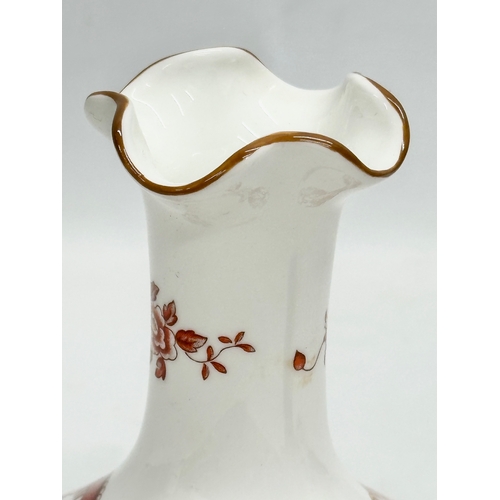 453 - A Crown Staffordshire ‘Rangoon’ vase. 15x20cm