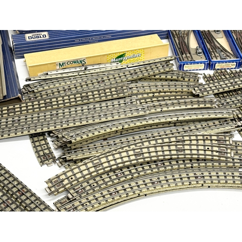 428 - A quantity of Hornby Dublo train tracks etc.