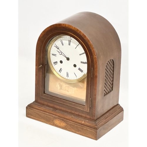 228 - A large inlaid mahogany fusee mantle clock with brass face. Circa 1890-1910. No key or pendulum. 28.... 