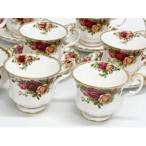 245 - Royal Albert ‘Old Country Roses’ tea set and bowls. 7 cups, 5 saucers, milk jug, sugar bowl sand 6 b... 