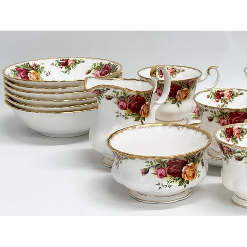 245 - Royal Albert ‘Old Country Roses’ tea set and bowls. 7 cups, 5 saucers, milk jug, sugar bowl sand 6 b... 