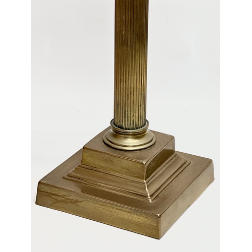 172 - A vintage brass table lamp with Corinthian style and reeded column. 64cm