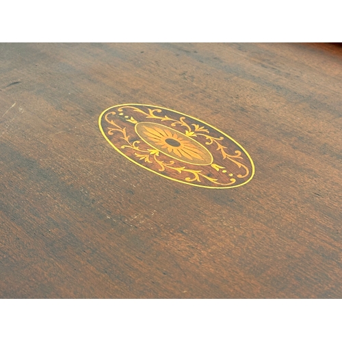 254 - An Edwardian inlaid mahogany serving tray. 62x37cm