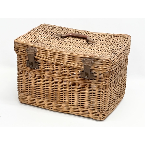 255 - A 1930’s wicker basket. 41x29x27cm