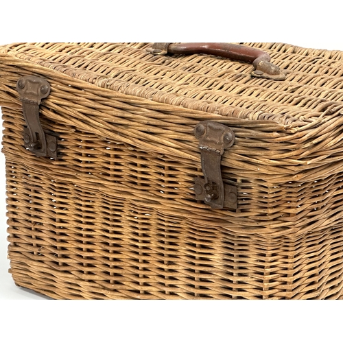 255 - A 1930’s wicker basket. 41x29x27cm