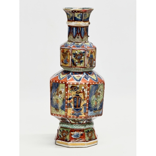 109 - An unusual 19th Century Japanese hand painted 4 tier vase. Mark underneath. 24cm