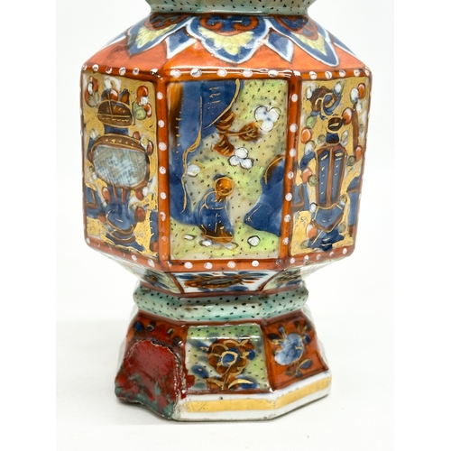 109 - An unusual 19th Century Japanese hand painted 4 tier vase. Mark underneath. 24cm