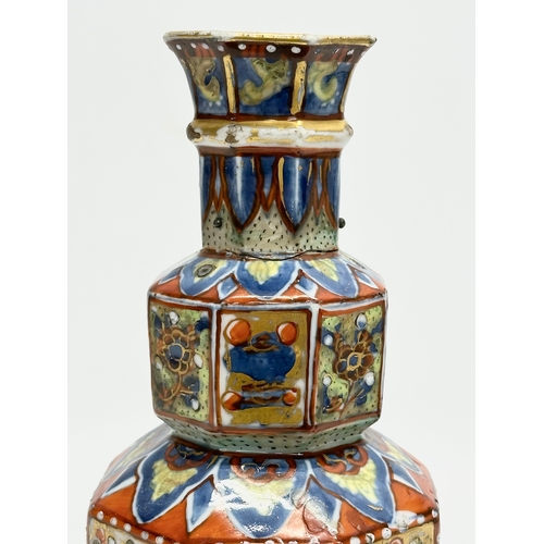 109 - An unusual 19th Century Japanese hand painted 4 tier vase. Mark underneath. 24cm