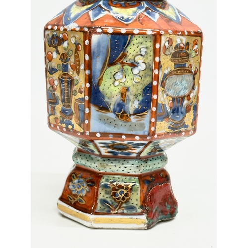 109 - An unusual 19th Century Japanese hand painted 4 tier vase. Mark underneath. 24cm