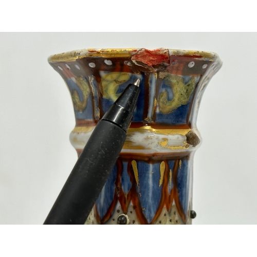 109 - An unusual 19th Century Japanese hand painted 4 tier vase. Mark underneath. 24cm