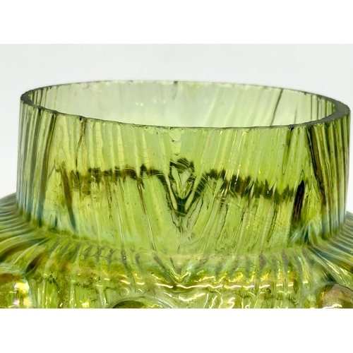 259 - A Loetz iridescent glass vase. Bohemian, circa 1900. 10x11cm