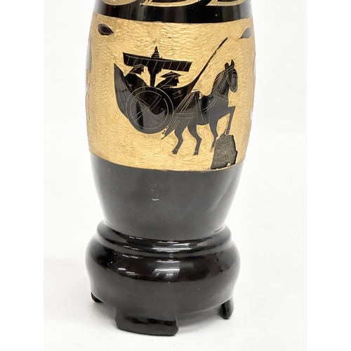 272 - An Early/Mid 20th Century inlaid black glazed oriental style vase. 28cm