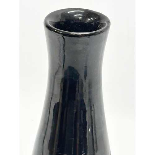 272 - An Early/Mid 20th Century inlaid black glazed oriental style vase. 28cm