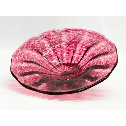 457 - A footed cranberry glass dish by Teign Valley Glass. 20x5.5cm