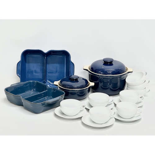 460 - Denby. 2 Denby ‘Imperial Blue’ casserole dishes and a pair of Denby ‘Boston’ food servers. 13 pieces... 