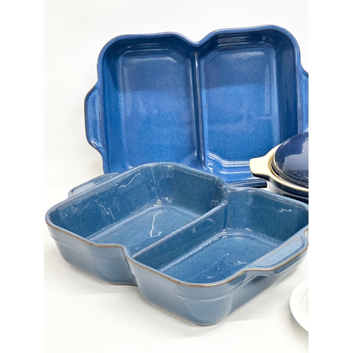 460 - Denby. 2 Denby ‘Imperial Blue’ casserole dishes and a pair of Denby ‘Boston’ food servers. 13 pieces... 