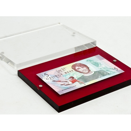 516 - A George Best £5 note in magnetic frame.