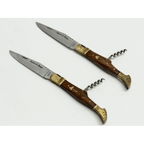 436 - A pair of Laguiole pocket knives with corkscrews. 22cm open.