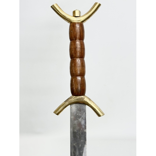 438 - A Celtic style sword. 81cm