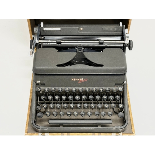 434 - A 1949 Hermes 2000 typewriter with case.