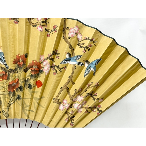 287 - A large Early 20th Century Chinese hand painted fan. 150x89cm