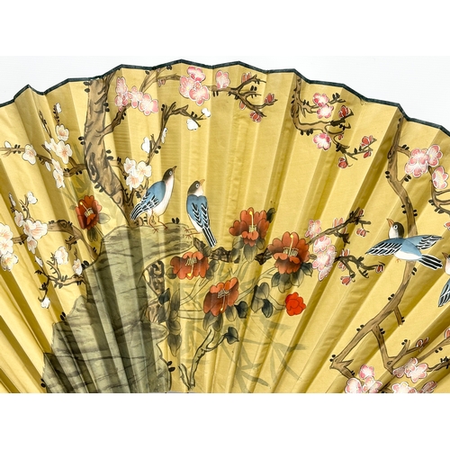 287 - A large Early 20th Century Chinese hand painted fan. 150x89cm