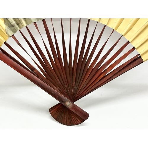 287 - A large Early 20th Century Chinese hand painted fan. 150x89cm