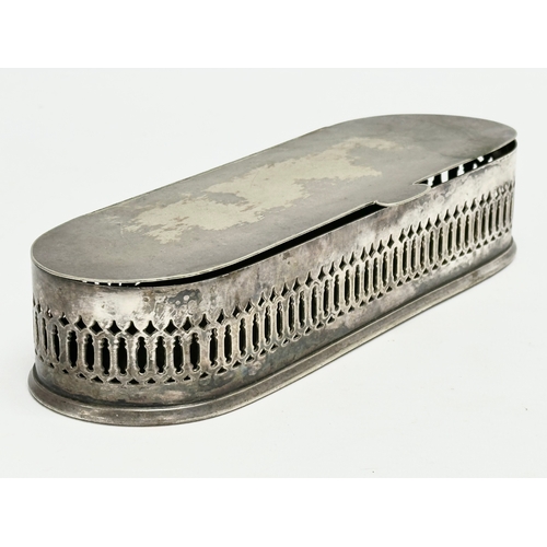 566 - A 19th Century pierced silver plated lidded trinket box. 22x8x4.5cm