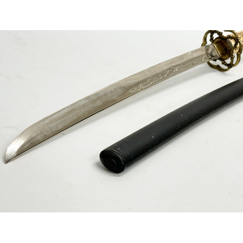 441 - A samurai style sword. 72cm