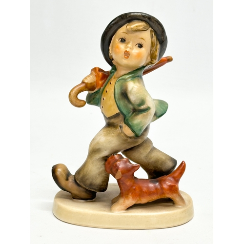 561 - 5 M.J. Hummel Goebel pottery figurines.