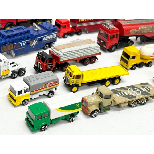 563 - A collection of model trucks. Mostly Matchbox and Corgi.