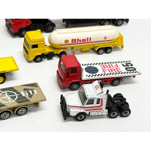 563 - A collection of model trucks. Mostly Matchbox and Corgi.