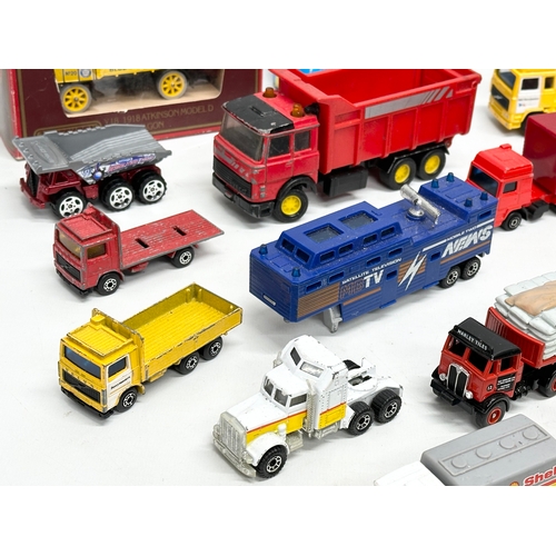 563 - A collection of model trucks. Mostly Matchbox and Corgi.