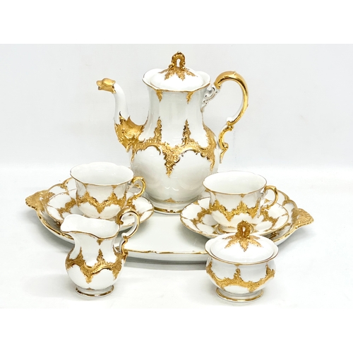 29 - A Meissen ‘B Form’ gilt porcelain Mocha tea for 2, tea service. Tray 45x32cm. Coffee pot/teapot 24x2... 