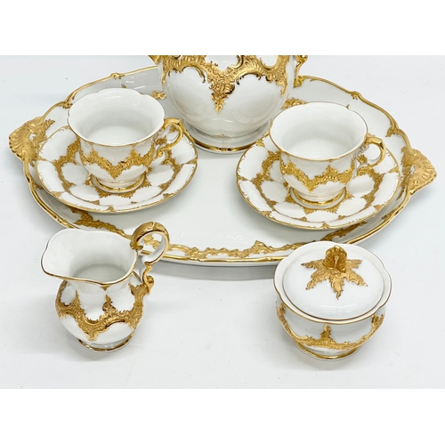 29 - A Meissen ‘B Form’ gilt porcelain Mocha tea for 2, tea service. Tray 45x32cm. Coffee pot/teapot 24x2... 