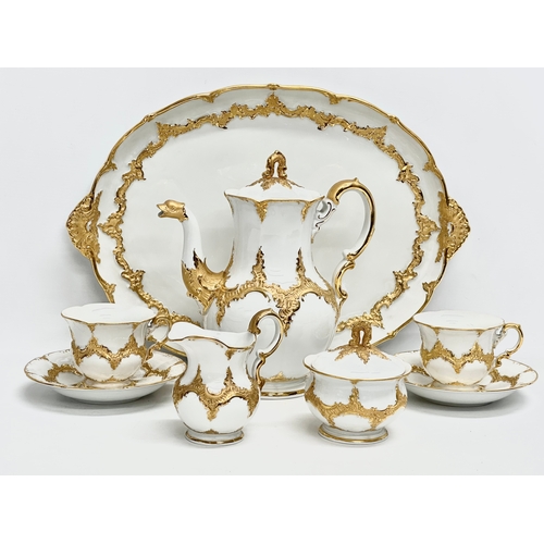 29 - A Meissen ‘B Form’ gilt porcelain Mocha tea for 2, tea service. Tray 45x32cm. Coffee pot/teapot 24x2... 