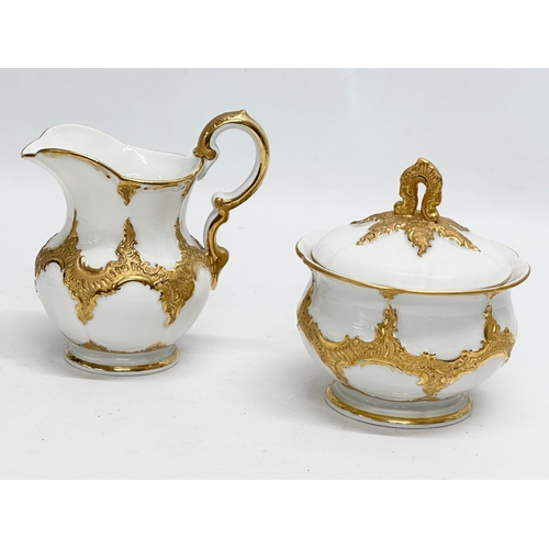 29 - A Meissen ‘B Form’ gilt porcelain Mocha tea for 2, tea service. Tray 45x32cm. Coffee pot/teapot 24x2... 