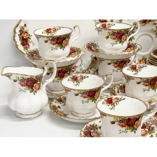 307 - A 41 piece Royal Albert ‘Old Country Roses’ tea service. 10 cups, 12 saucers, 2 milk jugs, sugar bow... 