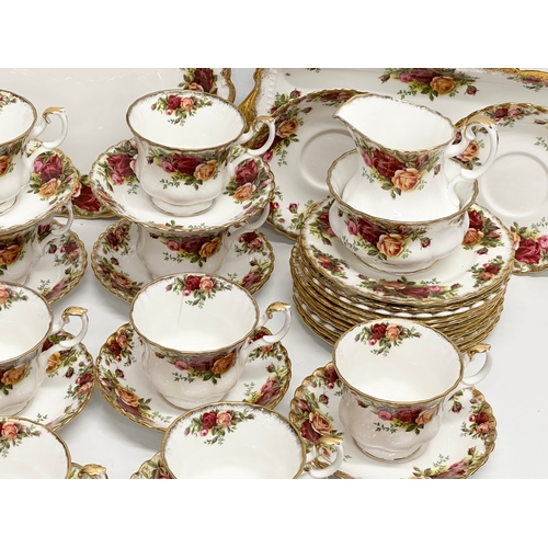 307 - A 41 piece Royal Albert ‘Old Country Roses’ tea service. 10 cups, 12 saucers, 2 milk jugs, sugar bow... 